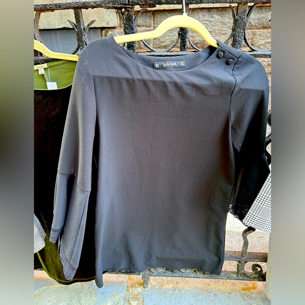 Black dress that can be worn for a nice evening out but could work for anything